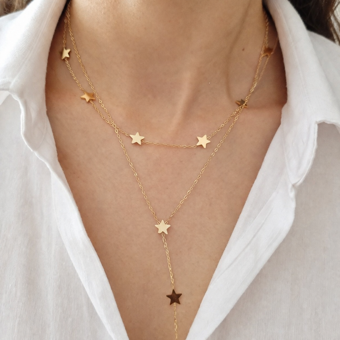 Collar estrellas corbatero dorado