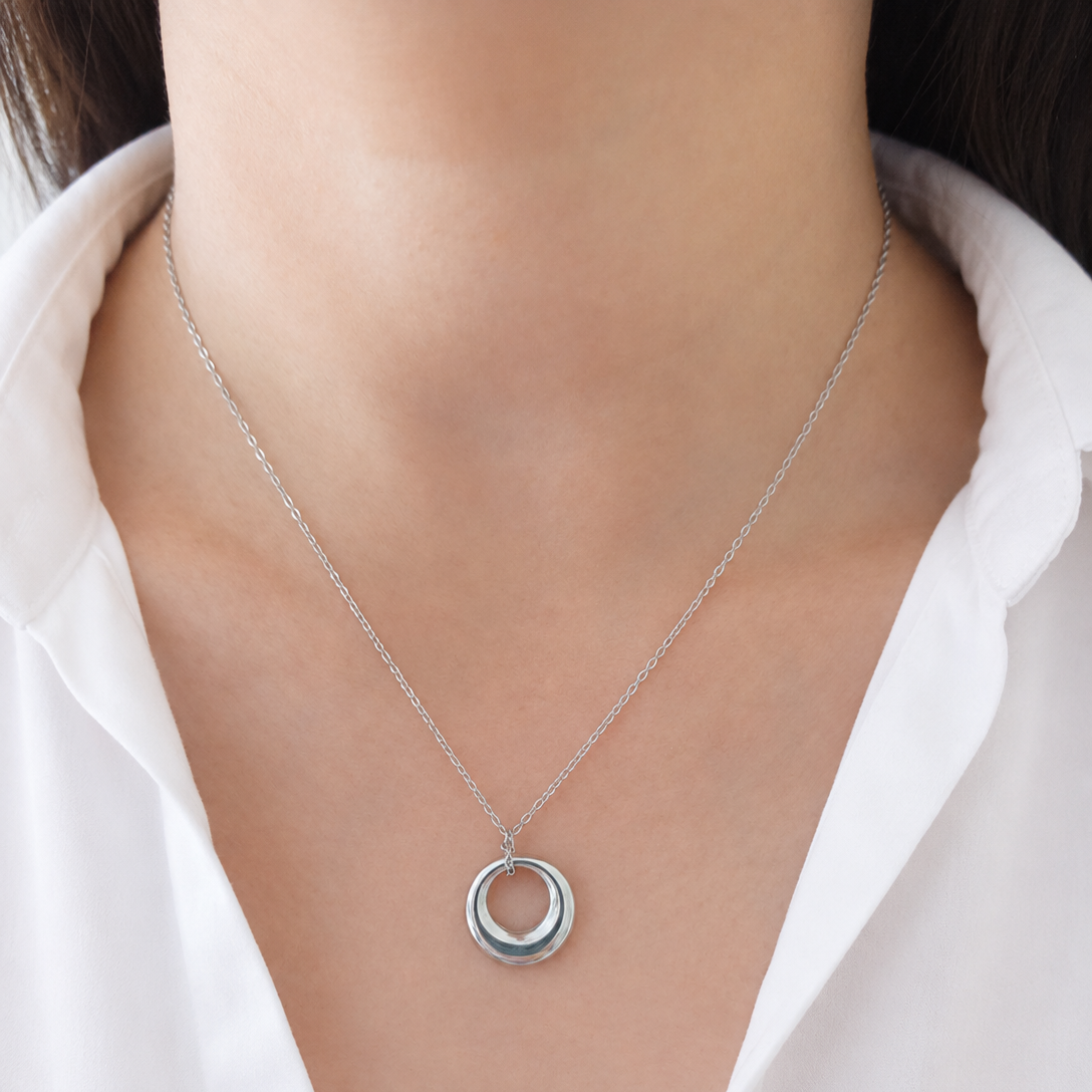Collar circulo acero dorado y plateado