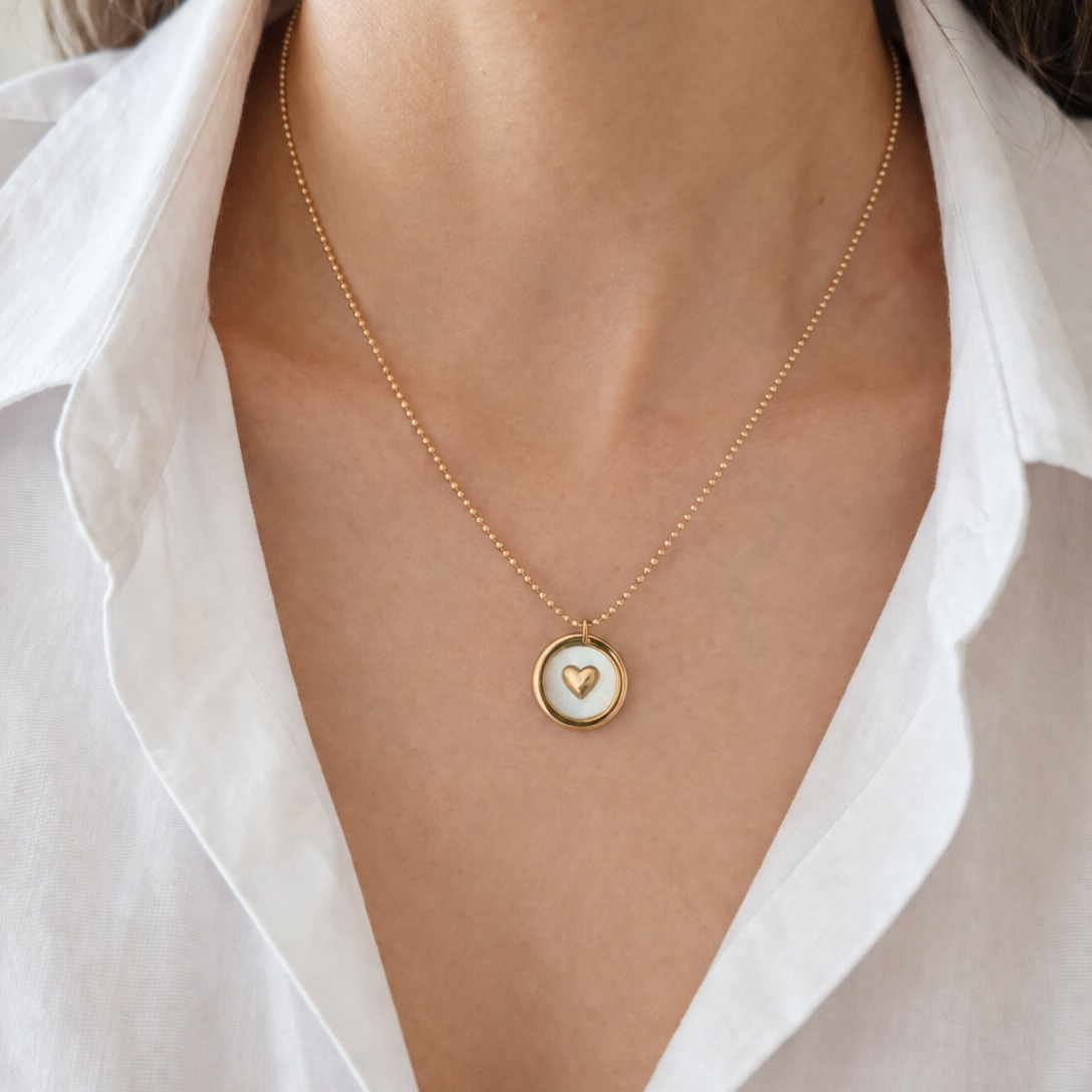 Collar corazon contorno dorado y plateado