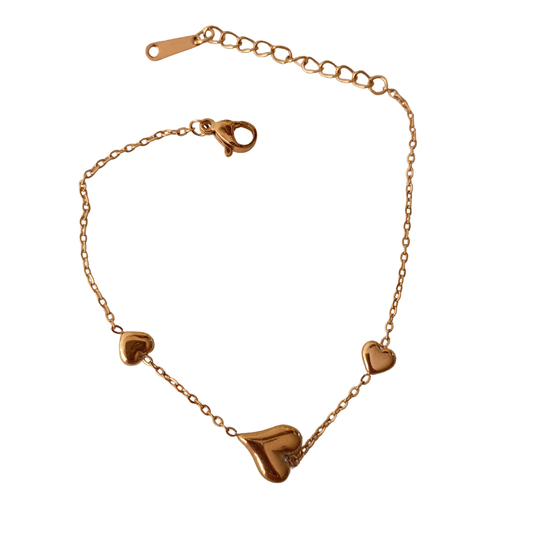 Pulsera corazones dorada acero
